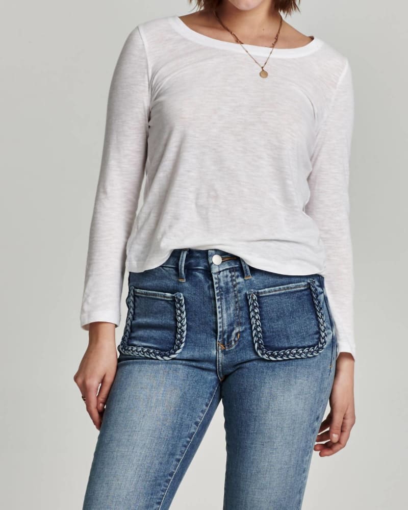Front of a model wearing a size L Cassie Long Sleeve Top in White in White by Another Love. | dia_product_style_image_id:345896